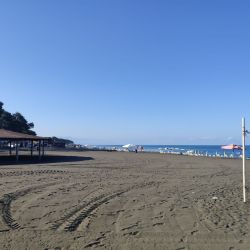 Foto de Ureki beach con recta y larga